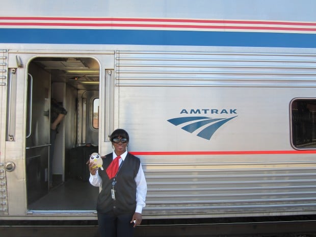 Sheena from Amtrak poses with Owly in Tucson, AZ