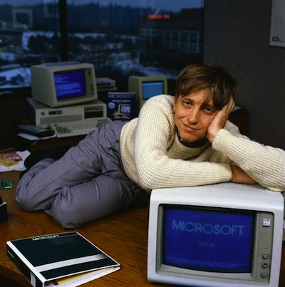 Bill Gates Reclining on Desk