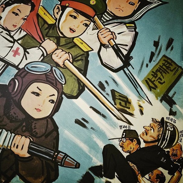 Painted propaganda, showing North Korean children in armed services uniforms attacking U.S., Japanese & SKorean soldiers, hangs in a room inside a Pyongyang kindergarten. Instagram by David Guttenfelder
