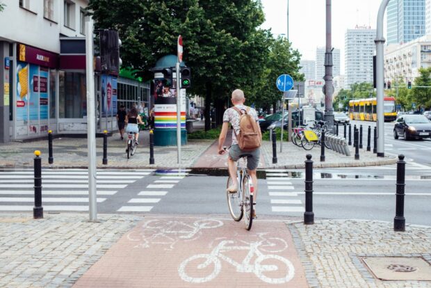 cyclist on bike path in urban centre