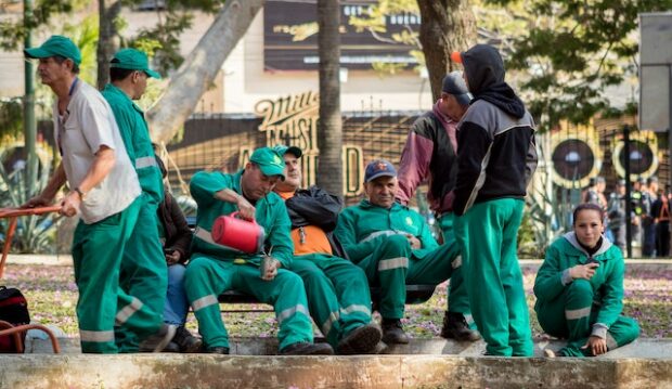 portrait of street workers in an urban setting