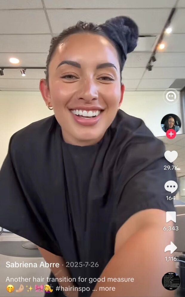 TikTok video showing creator Sabriena Abre showing her haircut transformation using recording cuts