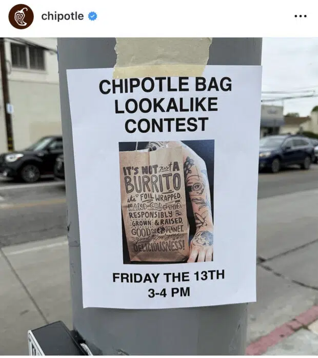A flyer taped to a street pole announcing a “Chipotle Bag Lookalike Contest,” mimicking celebrity lookalike contests