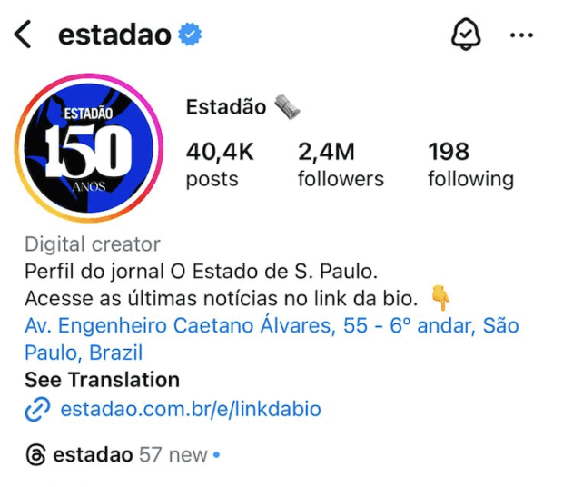 A imagem mostra o perfil do jornal Estadão no Instagram, cuja biografia contém a descrição da conta, uma frase call to action e o endereço completo da empresa.