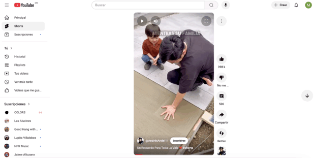 Página de inicio de YouTube Shorts que muestra a un hombre con la mano en el piso y un niño