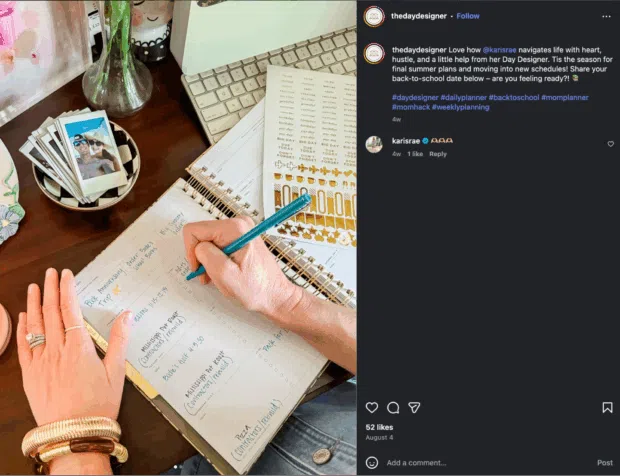 An Instagram post from @thedaydesigner, featuring a person writing in a planner, with a caption encouraging followers to share their "back-to-school" dates, showcasing engagement through user-generated content.