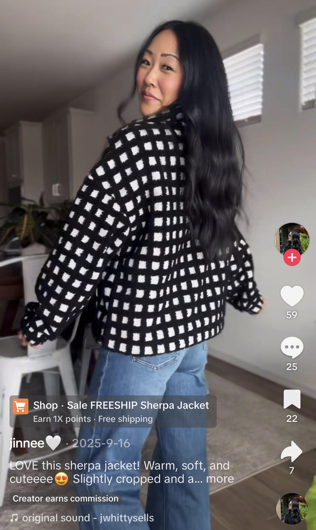 A TikTok creator modeling a jacket with a link to the TikTok Shop